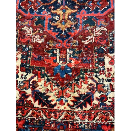 142 - ANTIQUE HERIZ CARPET, 330cm x 250cm.