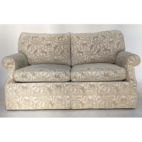 179 - SOFA, two seater with feather cushions and cut monkeys in trees fabric, (converts to bed) Approx  15... 