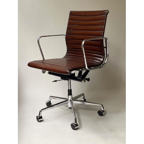 181 - REVOLVING DESK CHAIR, Charles and Ray Eames inspired with ribbed mid brown leather seat revolving an... 