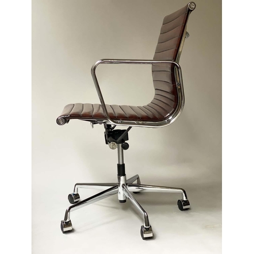 181 - REVOLVING DESK CHAIR, Charles and Ray Eames inspired with ribbed mid brown leather seat revolving an... 