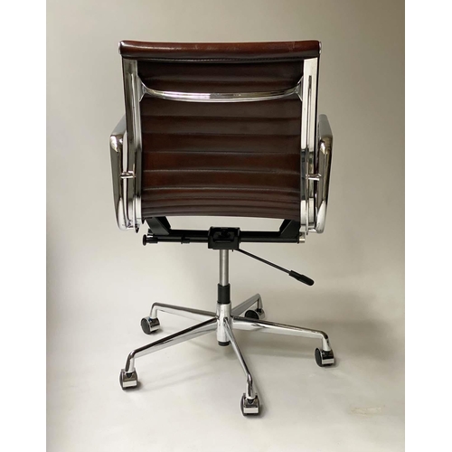 181 - REVOLVING DESK CHAIR, Charles and Ray Eames inspired with ribbed mid brown leather seat revolving an... 