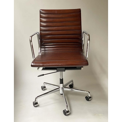 181 - REVOLVING DESK CHAIR, Charles and Ray Eames inspired with ribbed mid brown leather seat revolving an... 