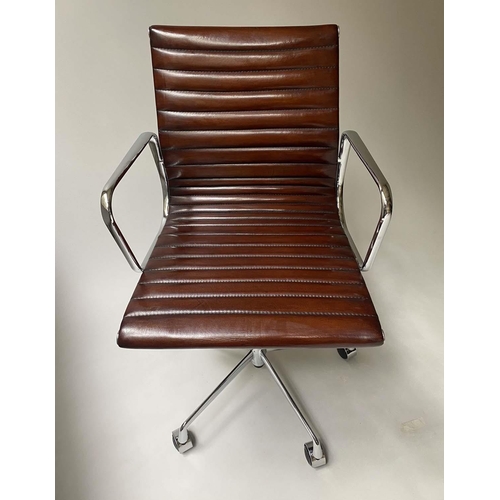 181 - REVOLVING DESK CHAIR, Charles and Ray Eames inspired with ribbed mid brown leather seat revolving an... 