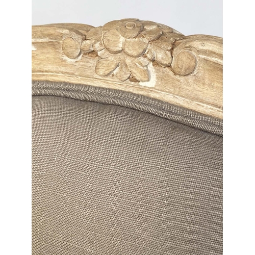 186 - WING ARMCHAIRS, a pair, French style carved with taupe grey natural linen upholstery, 67cm W. (2)