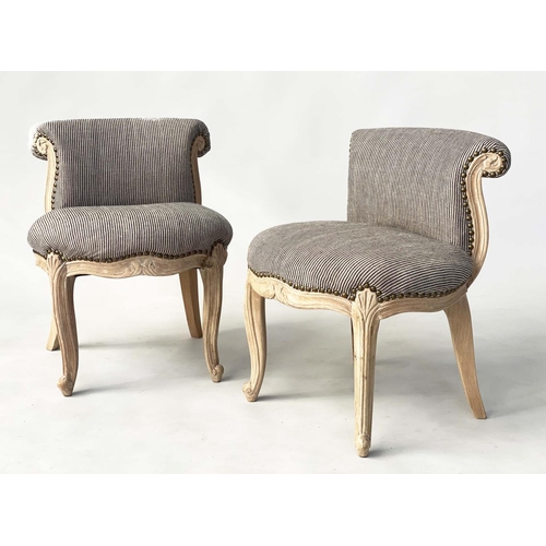 188 - COCKTAIL CHAIRS, a pair, French style carved with studded charcoal/natural ticking, 48cm W. (2)