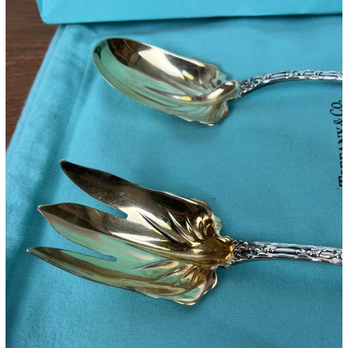 10 - TIFFANY AND CO STERLING SALAD SET, early 20th century parcel-gilded in Tiffany bags, 25cm L.