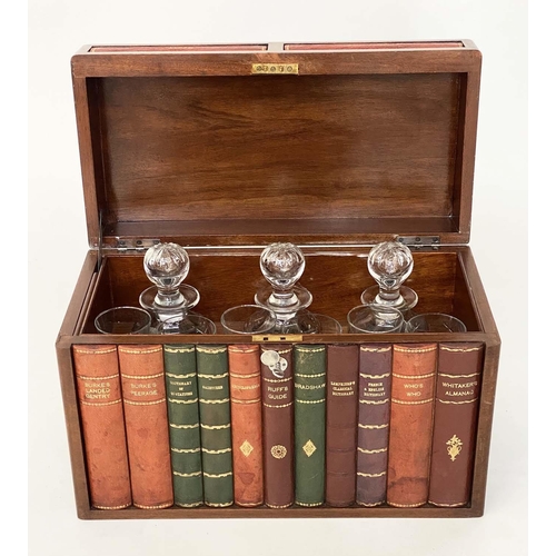 112 - TANTALUS, early 20th century figured walnut and faux book spine with three glass decanters, stamped ... 