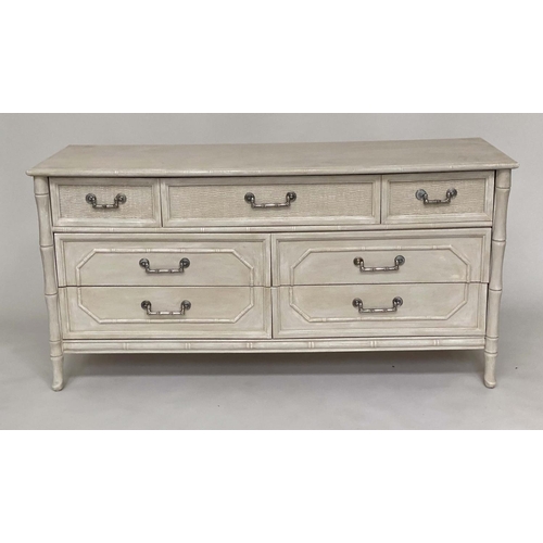 115 - FAUX BAMBOO LOW CHEST, traditionally grey painted and caned with panelled drawers above four further... 