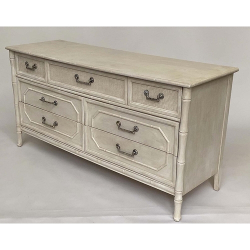 115 - FAUX BAMBOO LOW CHEST, traditionally grey painted and caned with panelled drawers above four further... 