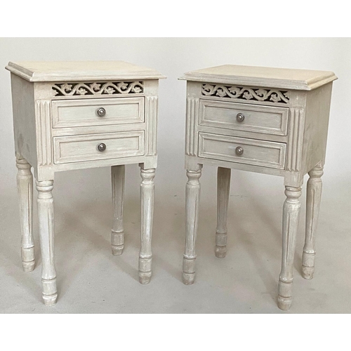 117 - BEDSIDE TABLES, a pair French style traditionally grey painted each with two drawers, pierced frieze... 