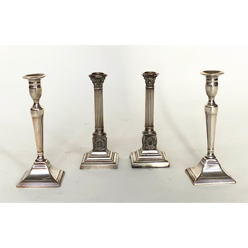 125 - CANDLESTICKS, a pair, early 20th century, Georgian style silvered with fluted columns and stepped pl... 