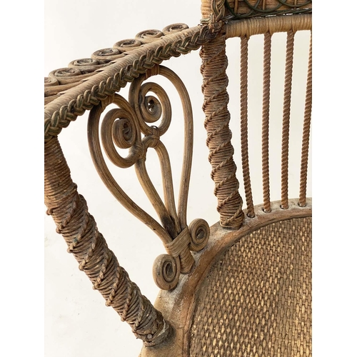 126 - ARMCHAIR, early 20th century 1930s rattan frame and green and natural intricately cane woven with st... 