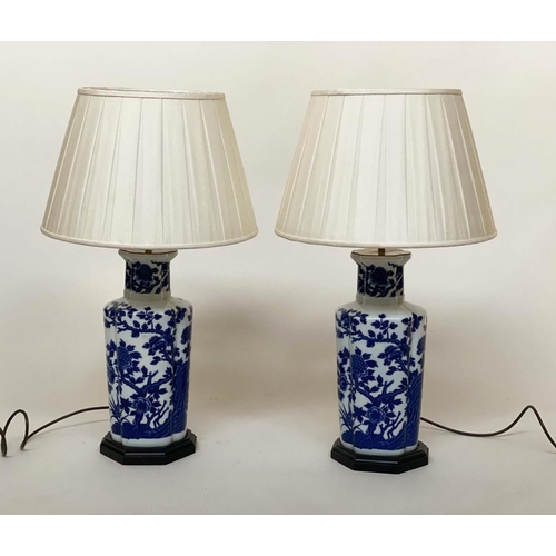 127 - TABLE LAMPS, a pair, Chinese blue and white ceramic of jar form with foliate decoration, with shades... 