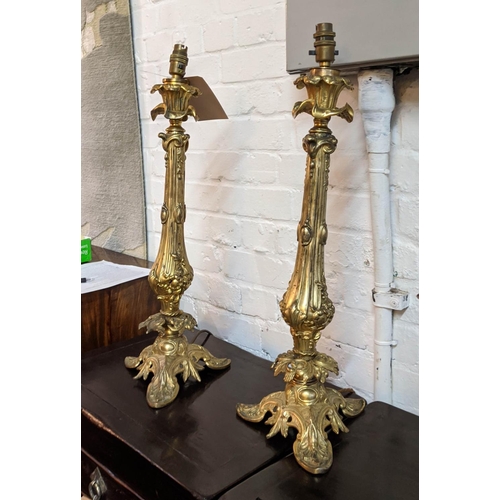 205 - ORMOLU CANDLESTICKS, a pair, 59cm H converted into table lamps. (2)