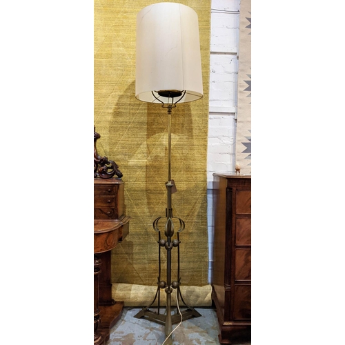 206 - FLOOR STANDING LAMP, 208cm H in the manner of W.A.S. Benson, metal with a shade.