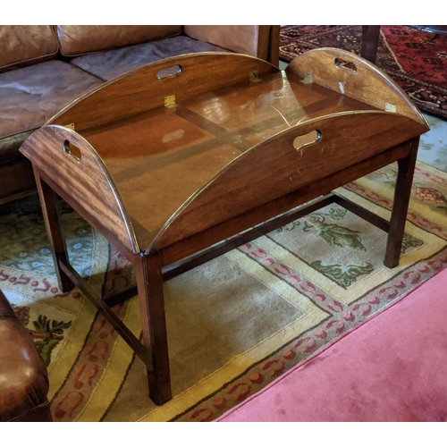 207 - BUTLER'S TRAY ON STAND, 121cm W open x 47cm H x 90cm D mahogany the top opening oval with drop flap ... 