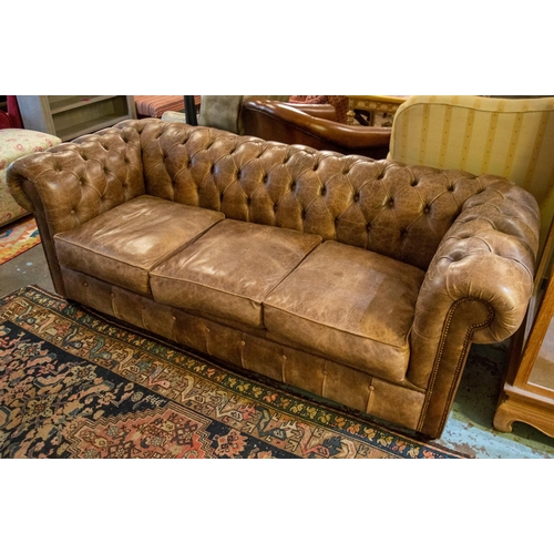 217 - CHESTERFIELD SOFA, 78cm H x 212cm x 92cm, three seater in tan leather.