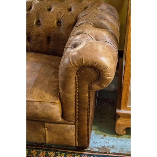 217 - CHESTERFIELD SOFA, 78cm H x 212cm x 92cm, three seater in tan leather.