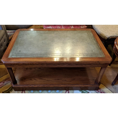 221 - COFFEE TABLE, 102cm x 46cm H x 63cm, oak with green leather top and canted corners.