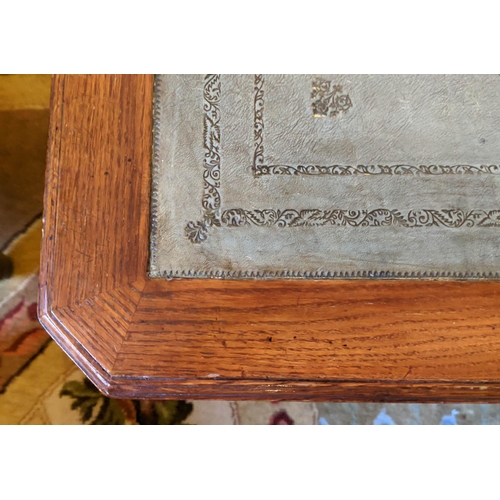 221 - COFFEE TABLE, 102cm x 46cm H x 63cm, oak with green leather top and canted corners.