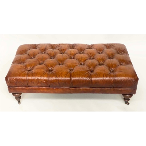 251 - CENTRE/HEARTH STOOL, rectangular deep buttoned upholstered mid brown leather with turned brass cappe... 