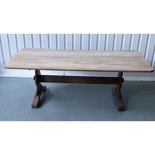 255 - REFECTORY DINING TABLE, round rectangular oak, planked and raised upon shaped trestle supports with ... 