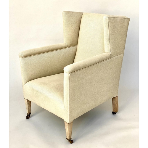 267 - WING ARMCHAIR, Edwardian parchment weave upholstery with tapering supports, 66cm W.