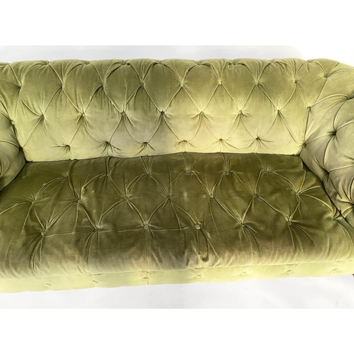 272 - CHESTERFIELD SOFA, Victorian mahogany with moss green velvet deep button upholstery with turned fron... 