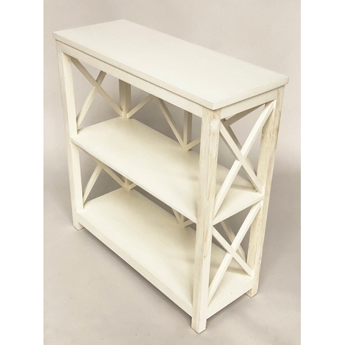 278 - OPEN BOOKCASE, Oka style white painted with two shelves and lattice framework, 85cm W x 33cm D x 90c... 