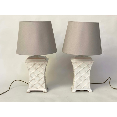 282 - TABLE LAMPS, a pair, white ceramic basket weave of waisted canister form with shades, 74cm H. (2)