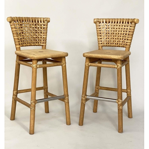 289 - BAR STOOLS, a pair, beech framed with leather woven backs, and footrest by 'McGuire', 101cm H (seat ... 