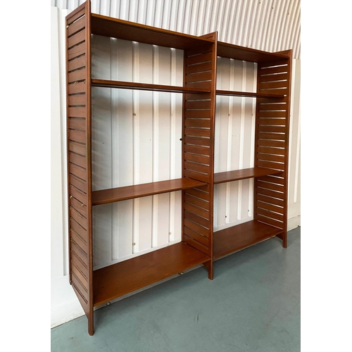 293 - LADDERAX, modular teak shelf unit comprising three uprights and nine shelves, 180cm W x 190cm H x 36... 