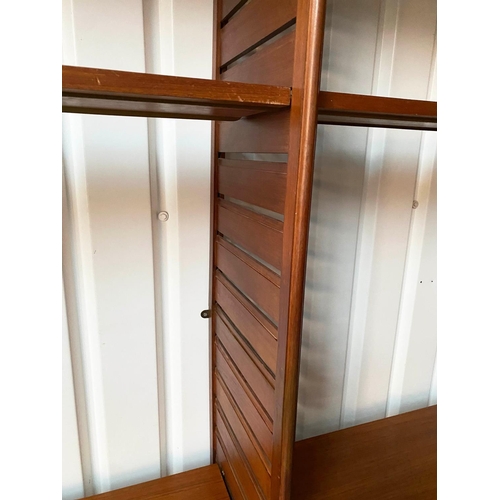 293 - LADDERAX, modular teak shelf unit comprising three uprights and nine shelves, 180cm W x 190cm H x 36... 