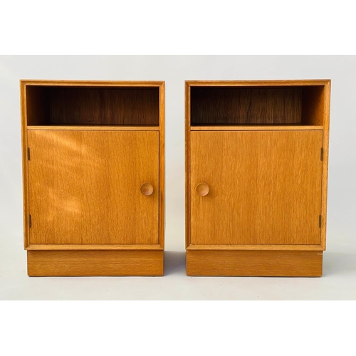 300 - MEREDEW CABINETS, a pair, 1960s oak each with panelled door enclosing shelf, 46cm W x 36cm x 65cm H.... 