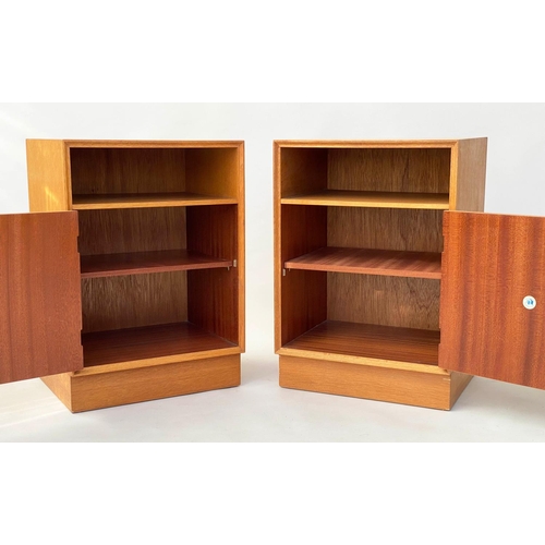 300 - MEREDEW CABINETS, a pair, 1960s oak each with panelled door enclosing shelf, 46cm W x 36cm x 65cm H.... 