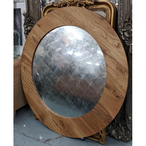 319 - WALL MIRROR, 140cm W, circular wooden frame with eglomise plate.