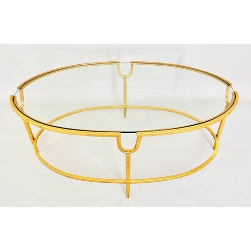 326 - MAISON JANSEN STYLE COCKTAIL TABLE, gilt metal frame, inserted glass top, 38cm W x 96cm W x 59cm.