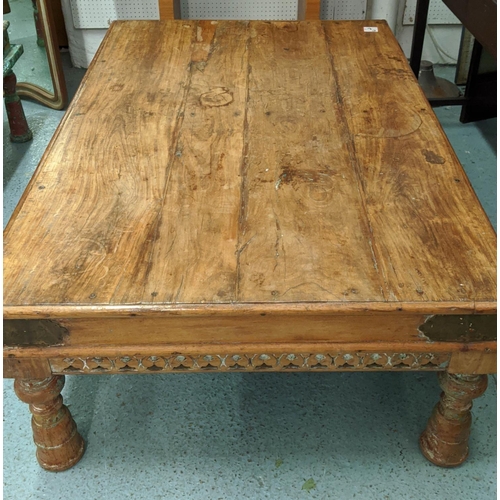 356 - THAKAT INDIAN COFFEE TABLE, 49cm H x 103cm x 161cm, carved wood, brass detail of rustic construction... 