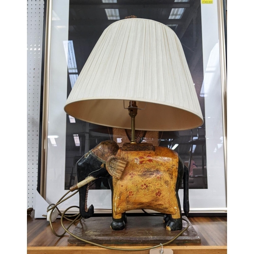 357 - ELEPHANT TABLE LAMP, base 41cm x 63cm H, 33cm H Indian painted and carved wood, with shade.