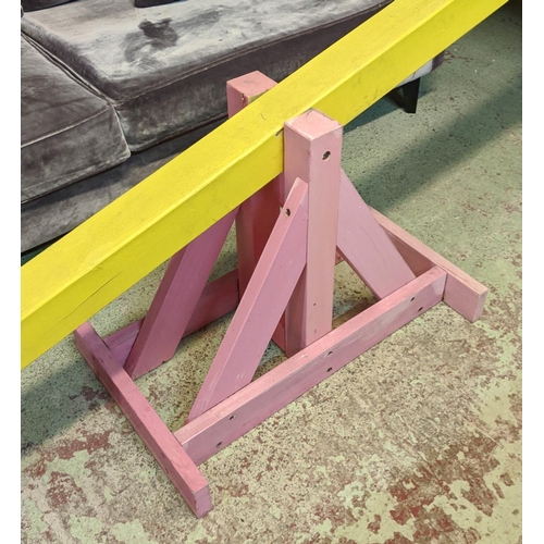 378 - FASHION SHOOT SET PROP SEESAW, 310cm L approx, painted finish.