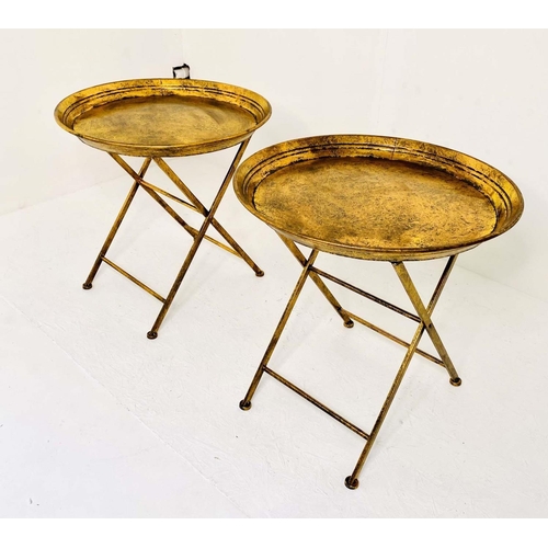 WINE TABLES, a pair, 66cm H x 66cm diam., of circular form, folding frames, gilt metal. (2)