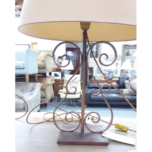 450 - TABLE LAMPS, a pair, 71cm H scrolled metal, each with a shade. (2)