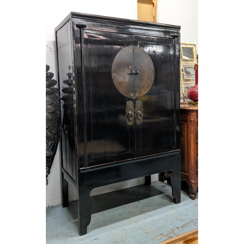 477 - CHINESE MARRIAGE CABINET, 106cm W x 176cm H x 61cm D black lacquered with two panelled doors enclosi... 