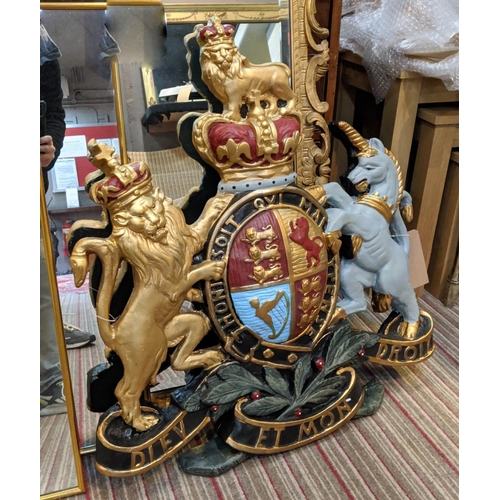 482 - ARMORIAL WALL PLAQUE, 77cm x 61cm polychrome finish.