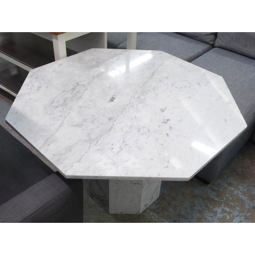 503 - CENTRE TABLE, 110cm x 71cm H marble with an octagonal top.