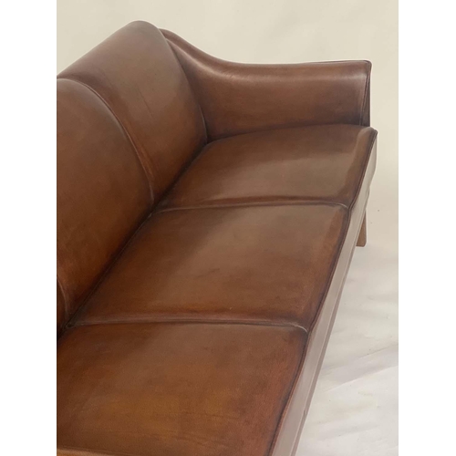 535 - SOFA, three seater, Danish style grained mid brown piped leather and teak supports, 181cm W.