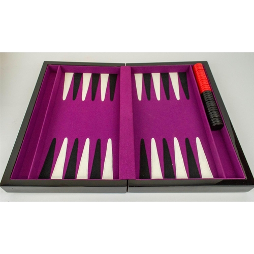 7 - PENHALIGON'S GAMES BOX, black lacquered fitted tray with card sets dice, chips dominos and folding b... 