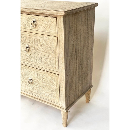 514 - OKA STYLE CHEST, painted with lattice moulded front and seven drawers, 130cm x 45cm D x 90cm H.