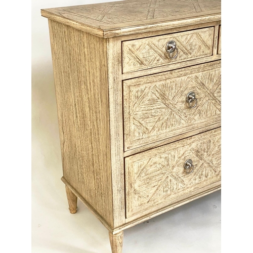 514 - OKA STYLE CHEST, painted with lattice moulded front and seven drawers, 130cm x 45cm D x 90cm H.