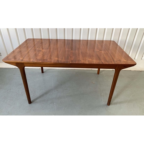 517 - MCINTOSH EXTENDING DINING TABLE, 1970's solid teak shaped rounded rectangular with two foldout hinge... 